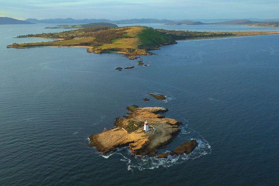 Aerial view of the Bruny Island neck and lighthouse, showing the narrow channel between North and South Bruny